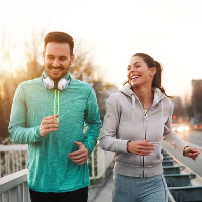 Residents enjoying a run downtown near The Marc, Palo Alto in Palo Alto, California