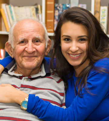 A resident and his family member at The Pointe at Summit Hills in Bakersfield, California