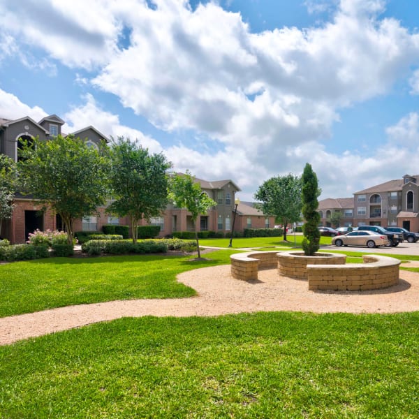 Clean and Grassy Area at Southwind at Silverlake Apartments in Pearland, Texas