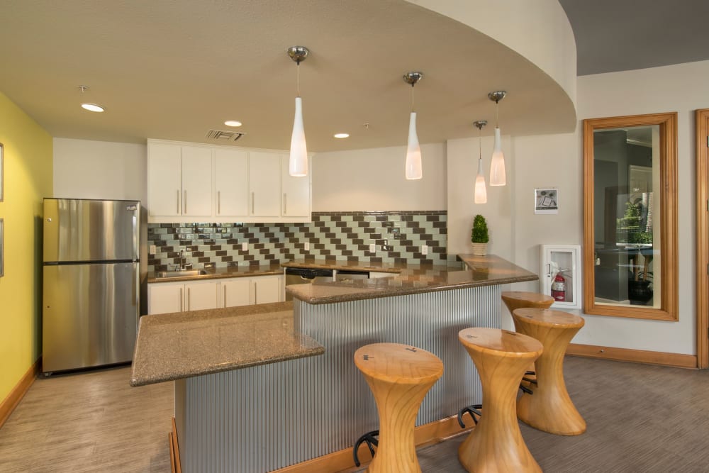 Indoor Clubhouse kitchen area at Esplanade Apartment Homes in Riverside, California