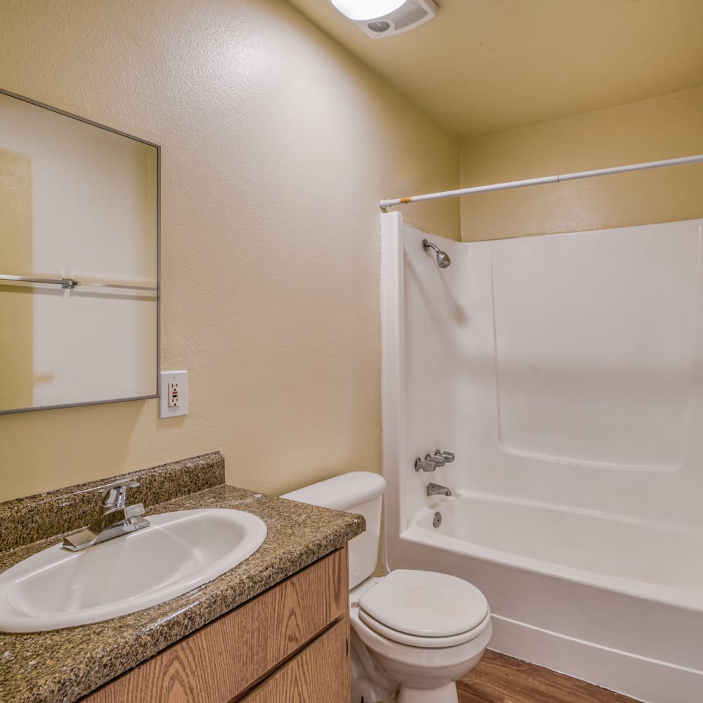 Model bathroom with a large shower and bath at Kings Villages in Pasadena, California
