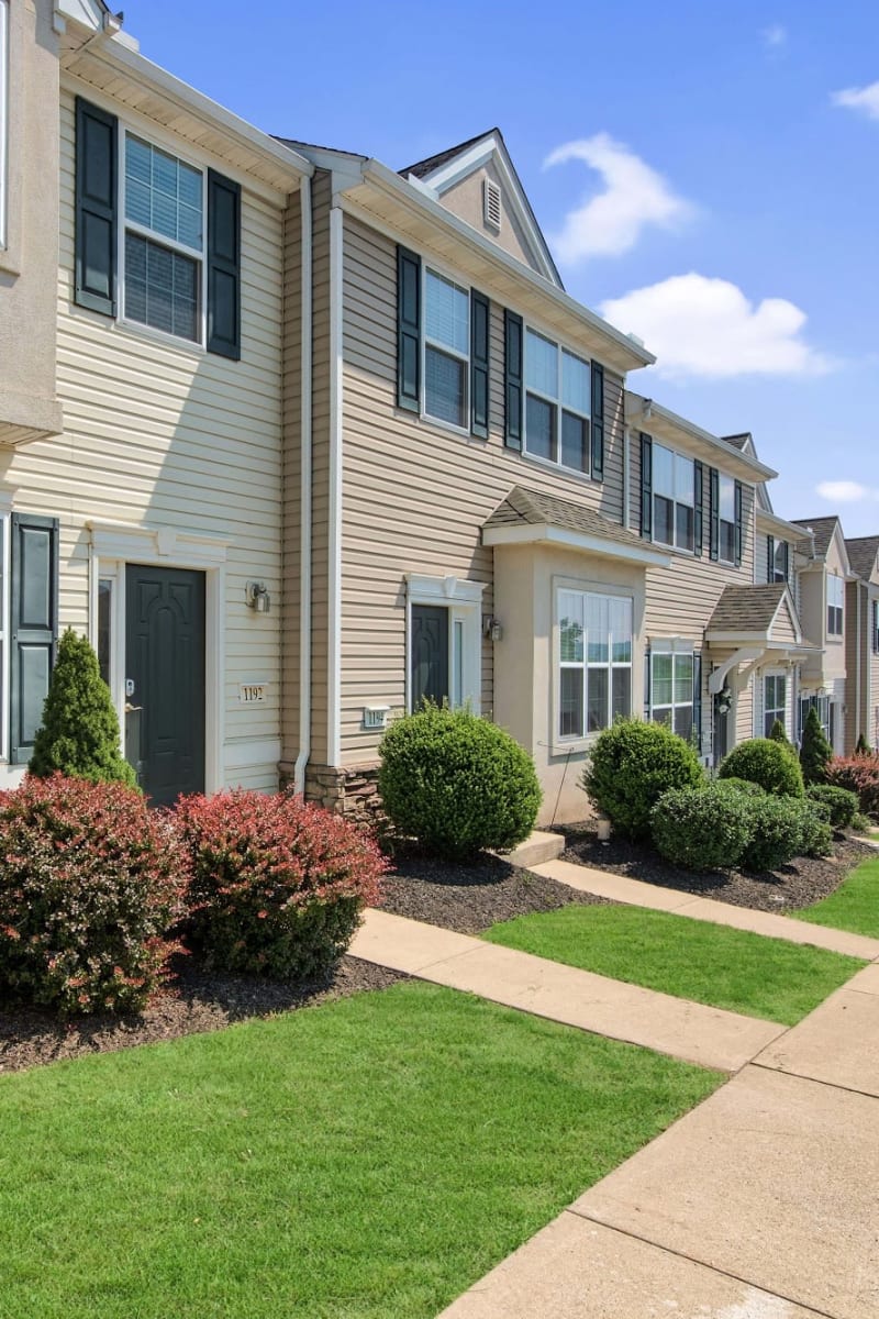 Exterior of Emerald Pointe Townhomes on a sunny spring day in Harrisburg, Pennsylvania