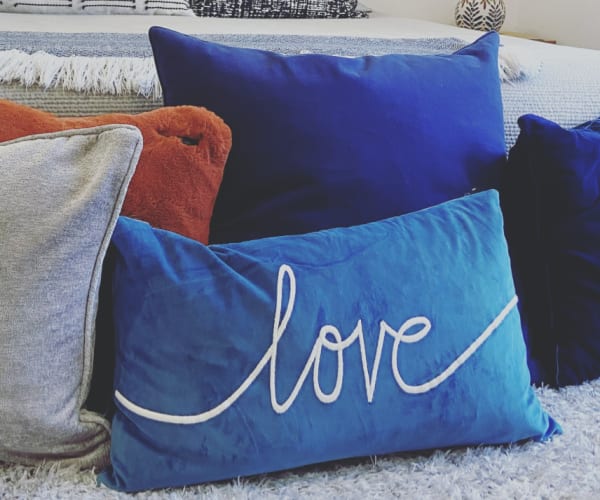 Blue pillows at Lofts At Navicent in Macon, Georgia