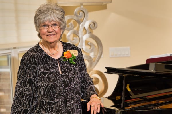 Resident and caregiver at Maple Ridge Gracious Retirement Living in Cedar Park, Texas
