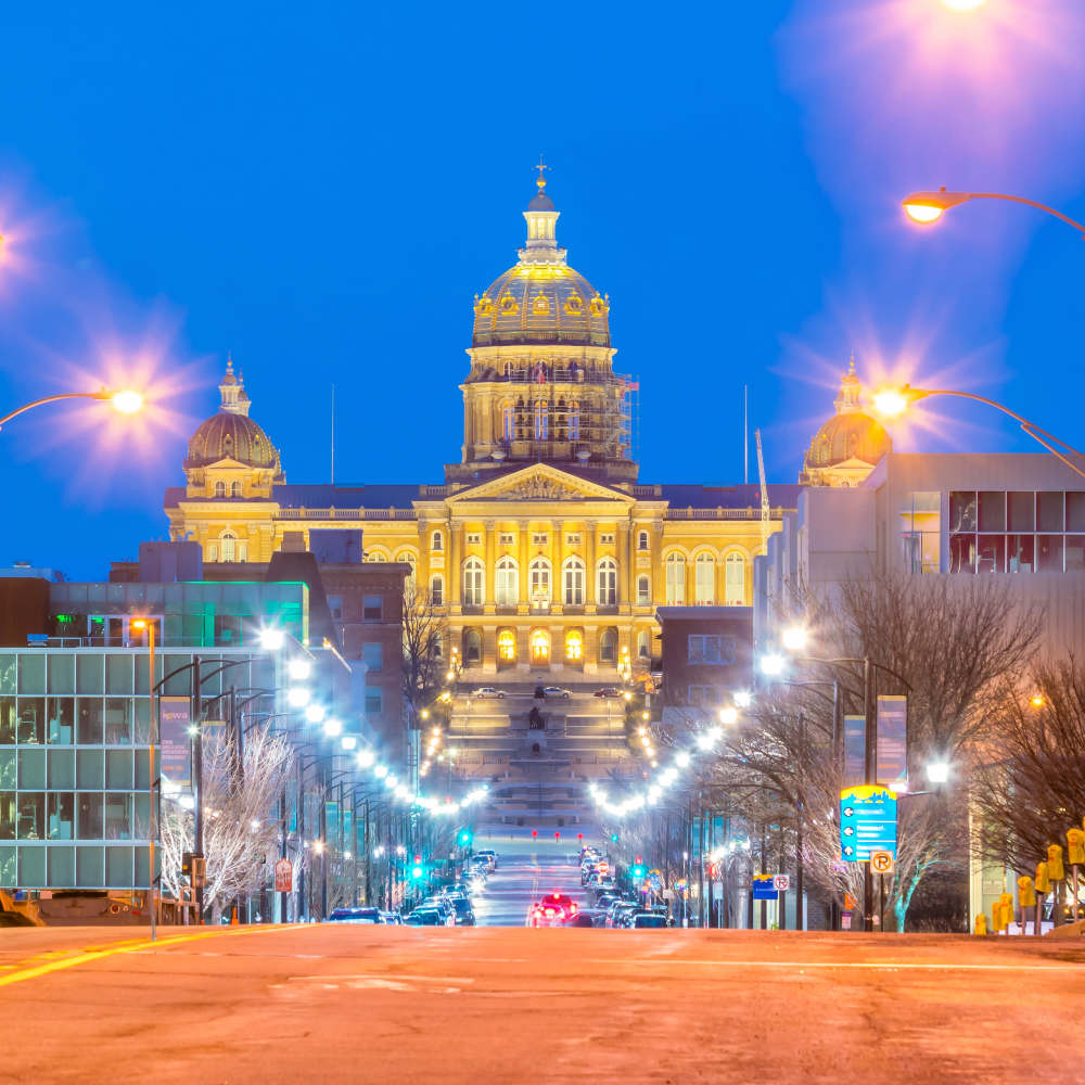 Image of  Des Moines, Iowa lit up building near East Village Square