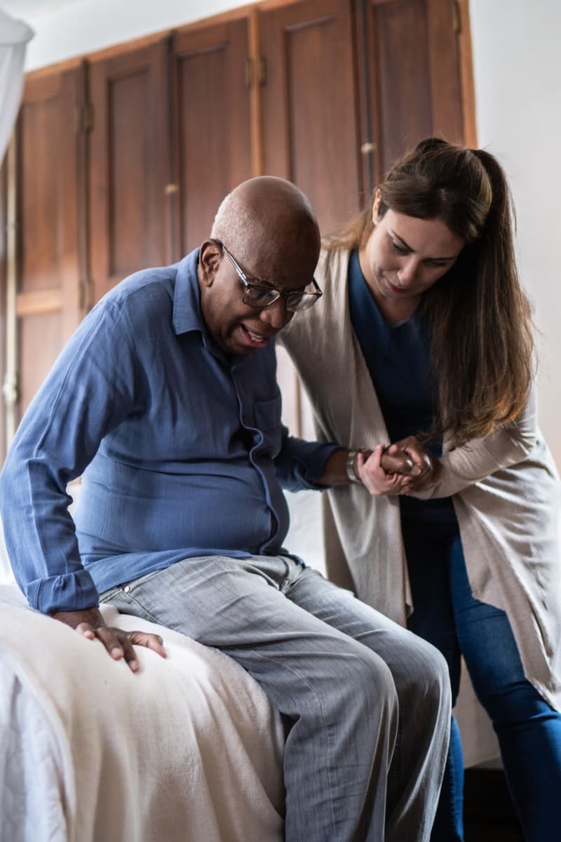 Caregiver helping resident at Trustwell Living at Miller Place in Celina, Ohio