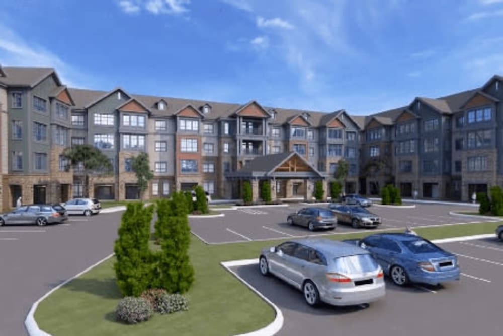 A rendering of cars in the front parking lot at Harmony at Greensboro in Greensboro, North Carolina
