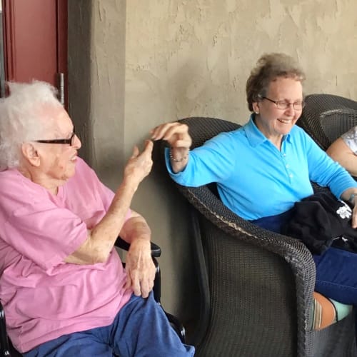 Residents socializing at Glen Carr House Memory Care in Derby, Kansas