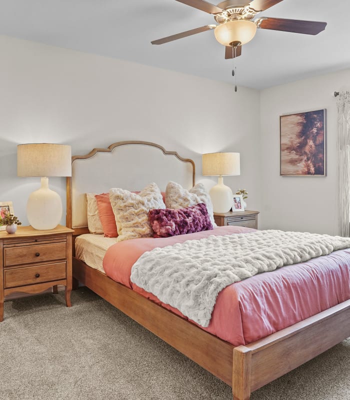 Spacious carpeted bedroom at Center 301 Apartments in Belton, Missouri