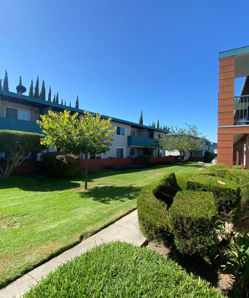 Exterior view of apartment at Terrace Garden Apartment Homes in San Leandro, California