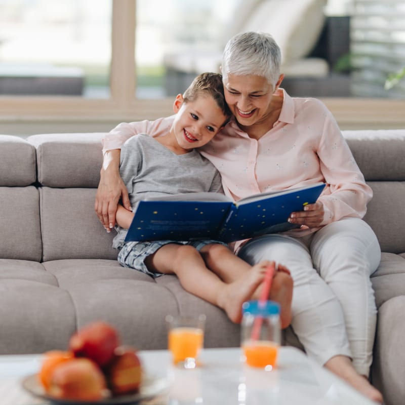 Resident reading with her grandson at Cielo Azul in Palmdale, California