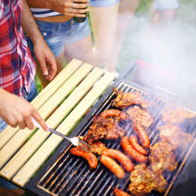 A resident grilling at Chollas Heights Historical in San Diego, California