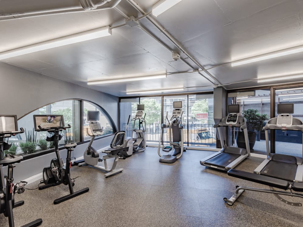 Spin bikes, treadmills, and more in the fitness center at Tower 801 in Seattle, Washington