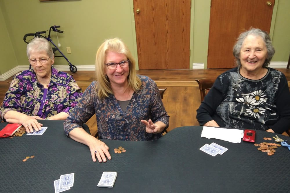 Residents playing cards at The Iris Senior Living in Great Falls, Montana. 