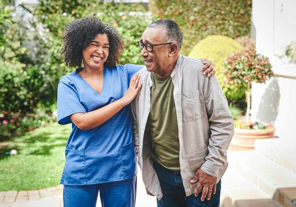 Caretaker joining resident for a walk at Clearwater Beaverton in Beaverton, Oregon