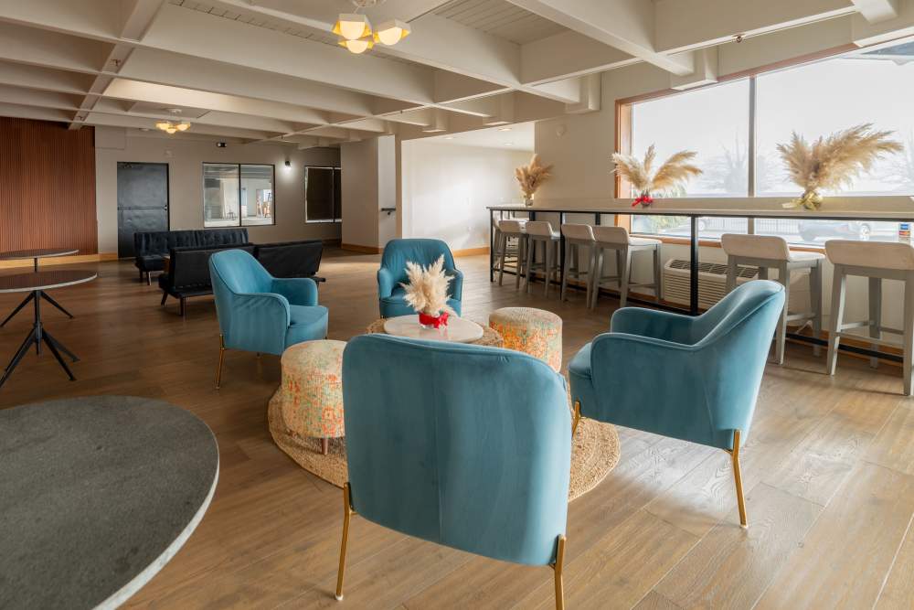 Resident lounge with individual Work Stations at Thea Apartments in Tacoma, Washington