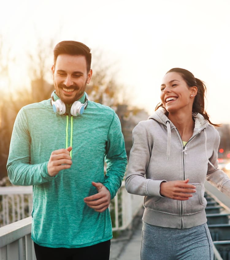 Residents on a relaxing run near Sofi Riverview Park in San Jose, California
