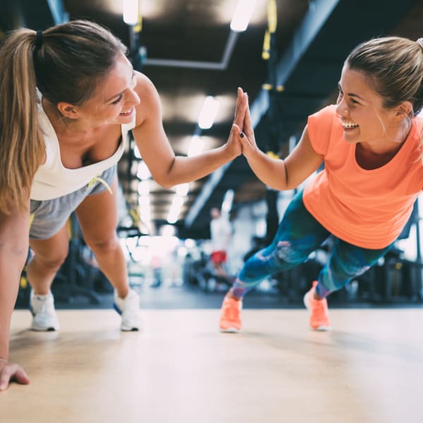 Friends working out at the amazing fitness center at ArLo in Phoenix, Arizona