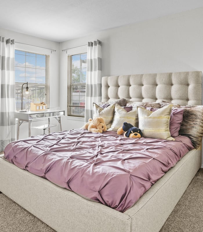 Bedroom dog stuffed animals at The Remington Apartments in Wichita, Kansas