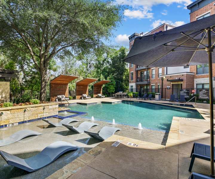 Resort-style swimming pool at Trinity Bluff & Trinity District in Fort Worth, Texas
