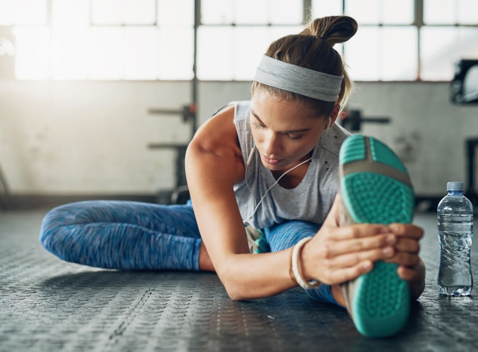 Resident stretching after a nice workout at Sofi Danvers in Danvers, Massachusetts