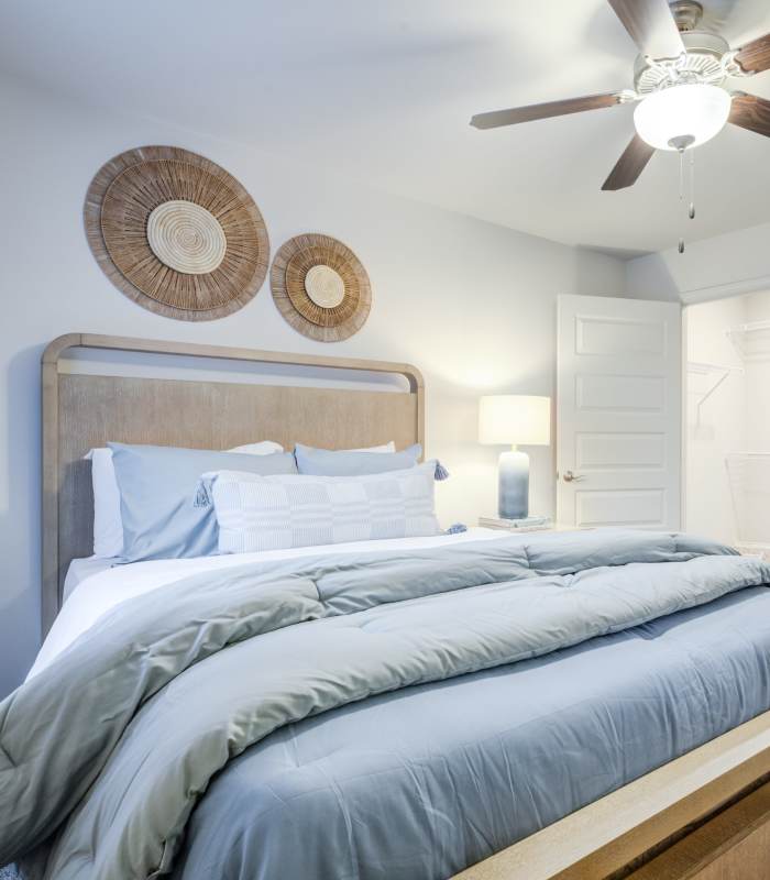 Bedroom with ceiling fan at Ridge at 66 in Yukon, Oklahoma