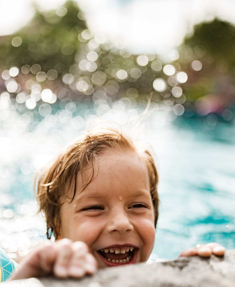 A child in a swimming pool at Hudson at Carolina Forest in Myrtle Beach, South Carolina
