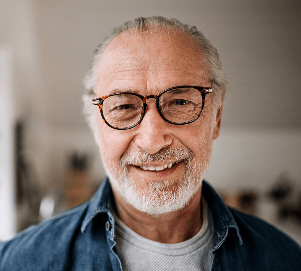 Smiling resident in his apartment at The Manor at Market Square in Reading, Pennsylvania