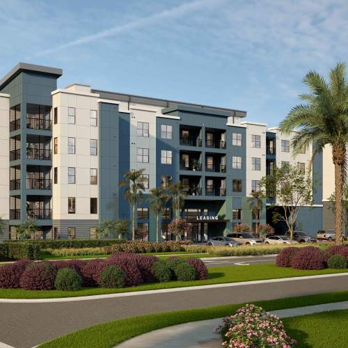 Exterior apartment community with greenery at Grande Pointe in Orlando, Florida