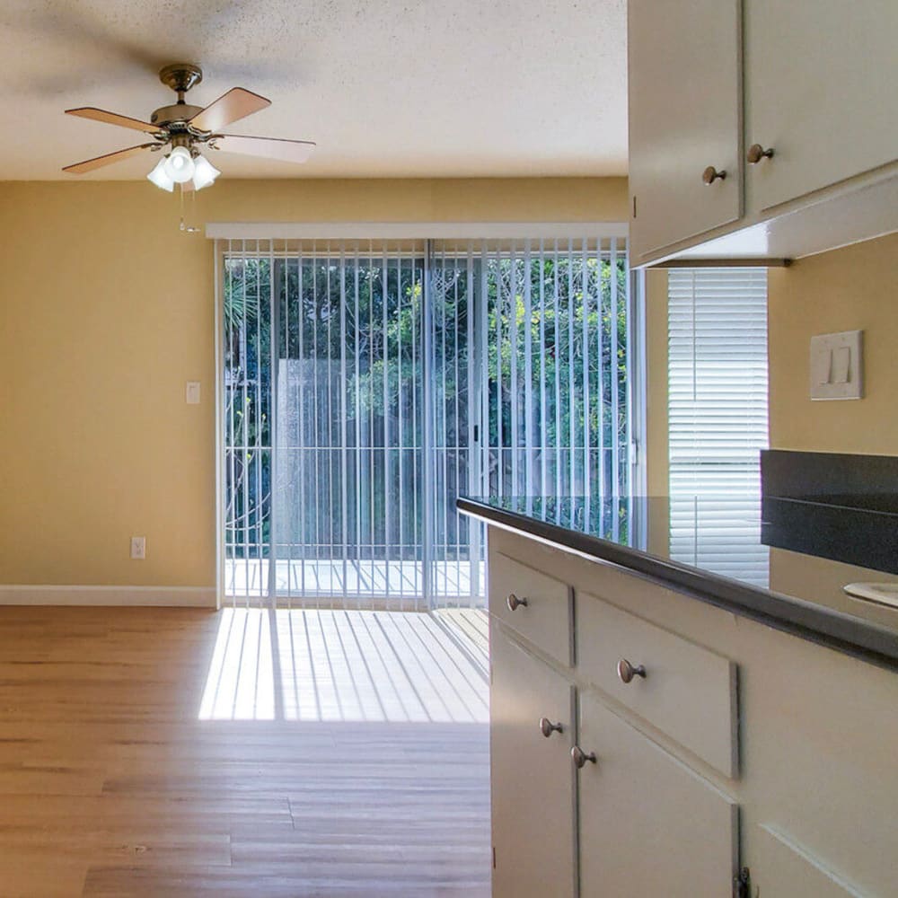 View of the private balcony outside from a model home's kitchen at Mission Rock at San Rafael in San Rafael, California