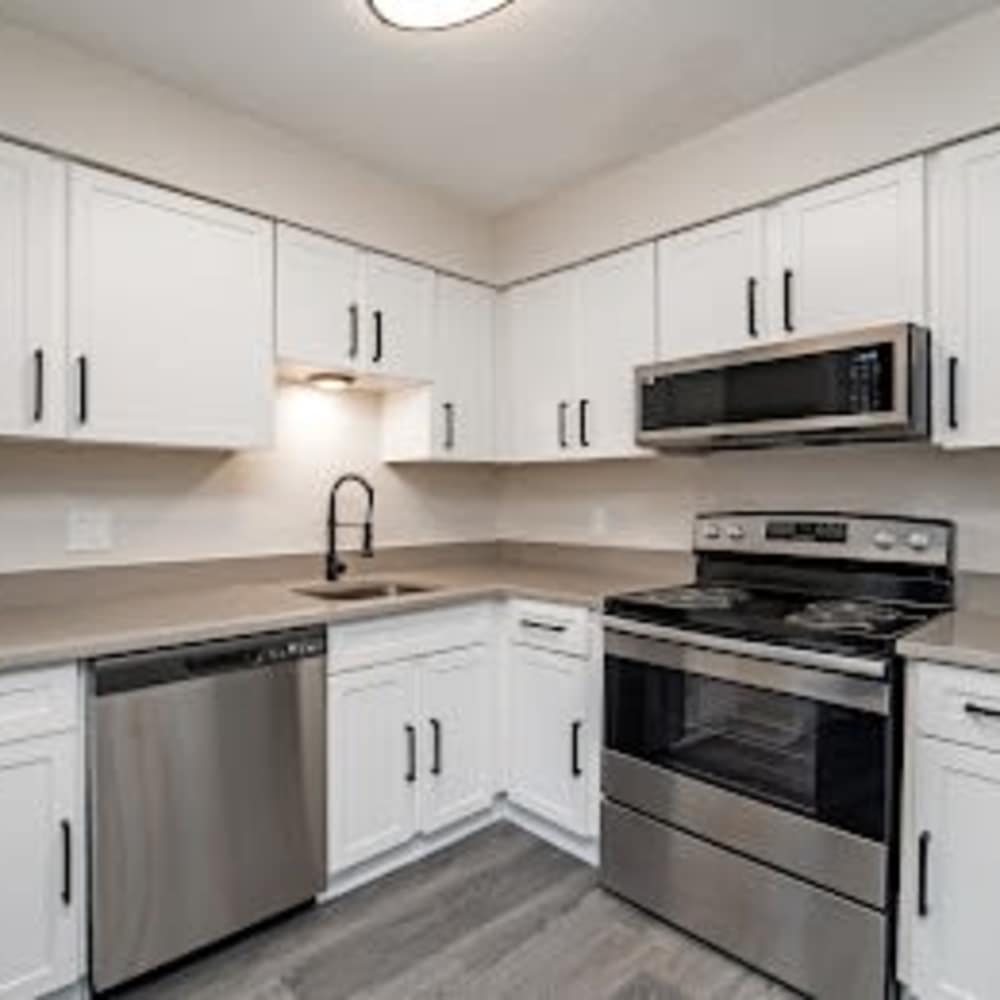 Kitchen with wooden cabinets at Sweetbay in Chattanooga, Tennessee