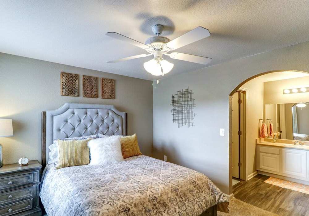 Spacious bedroom with attached bathroom at The Reserve at Kanapaha in Gainesville, Florida