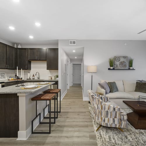 Modern and luxurious kitchen and living room at Gentry East Apartments in Cincinnati, Ohio