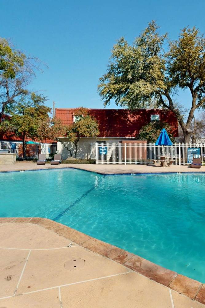 Community swimming pool at Tucasa Townhomes in Irving, Texas,