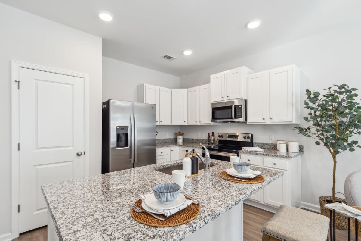 Granite countertops in a model apartment at Artisan Living North Beach in Santa Rosa Beach, Florida