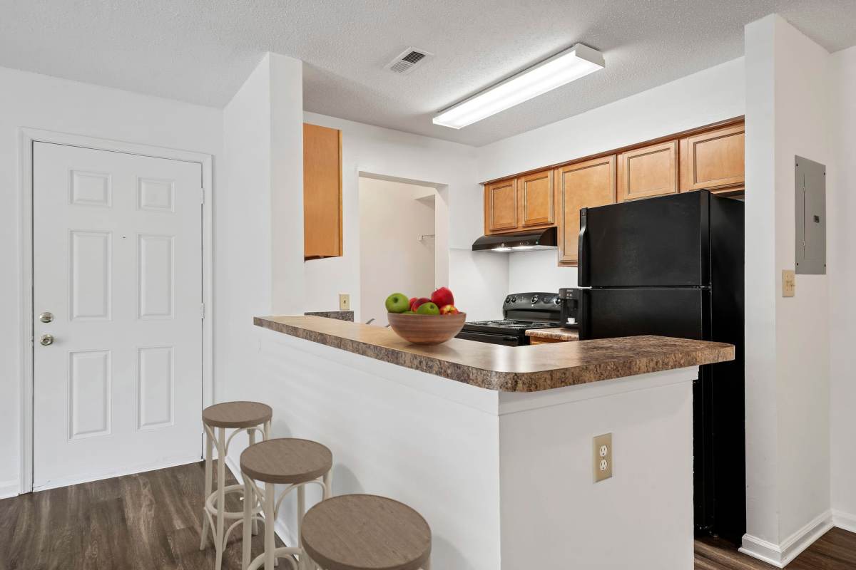 Kitchen with breakfast counter at Bradford Mews in Smithfield, Virginia