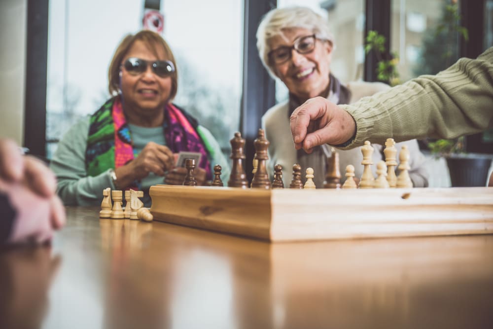 Residents enjoying a game of chess at Holden of Bellevue in Bellevue, Washington