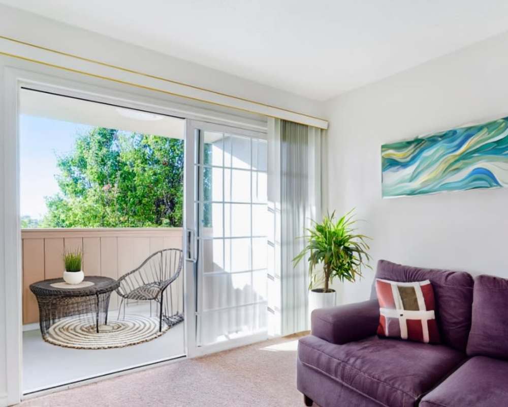 Sliding doors to balcony at St. Moritz Garden Apartments in San Leandro, California