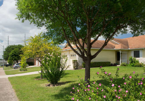 Exterior view of the community with greenery all around at Buckingham Place in Austin, Texas