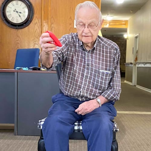 Resident playing cornhole at Canoe Brook Assisted Living in Ardmore, Oklahoma
