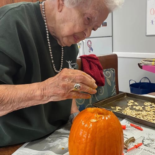 Resident gardening at Saunders House in Wahoo, Nebraska