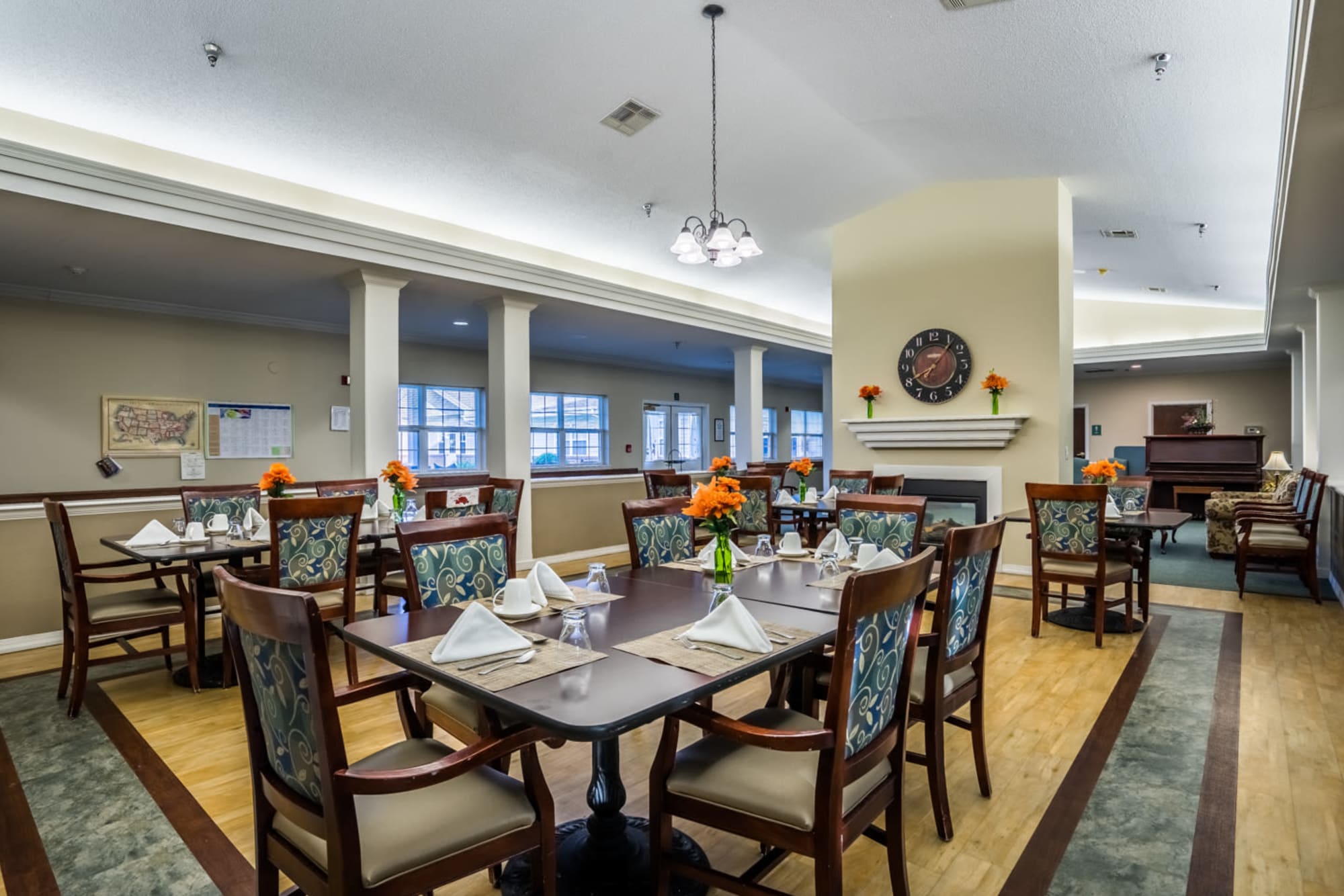 Dining room with wood accents at Madison House in Norfolk, Nebraska