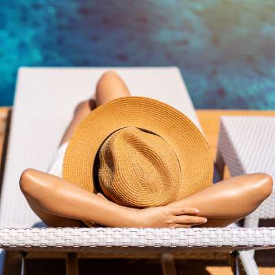 Relaxing by the pool at Millenium Cove in Orlando, Florida