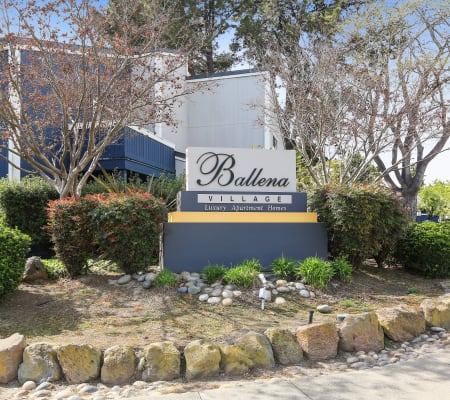 Apartment sign at Ballena Village Apartment Homes in Alameda, California