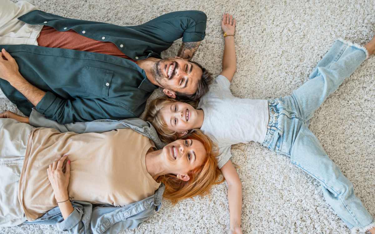 Happy family at Huffman Mill Townhomes in Burlington, North Carolina