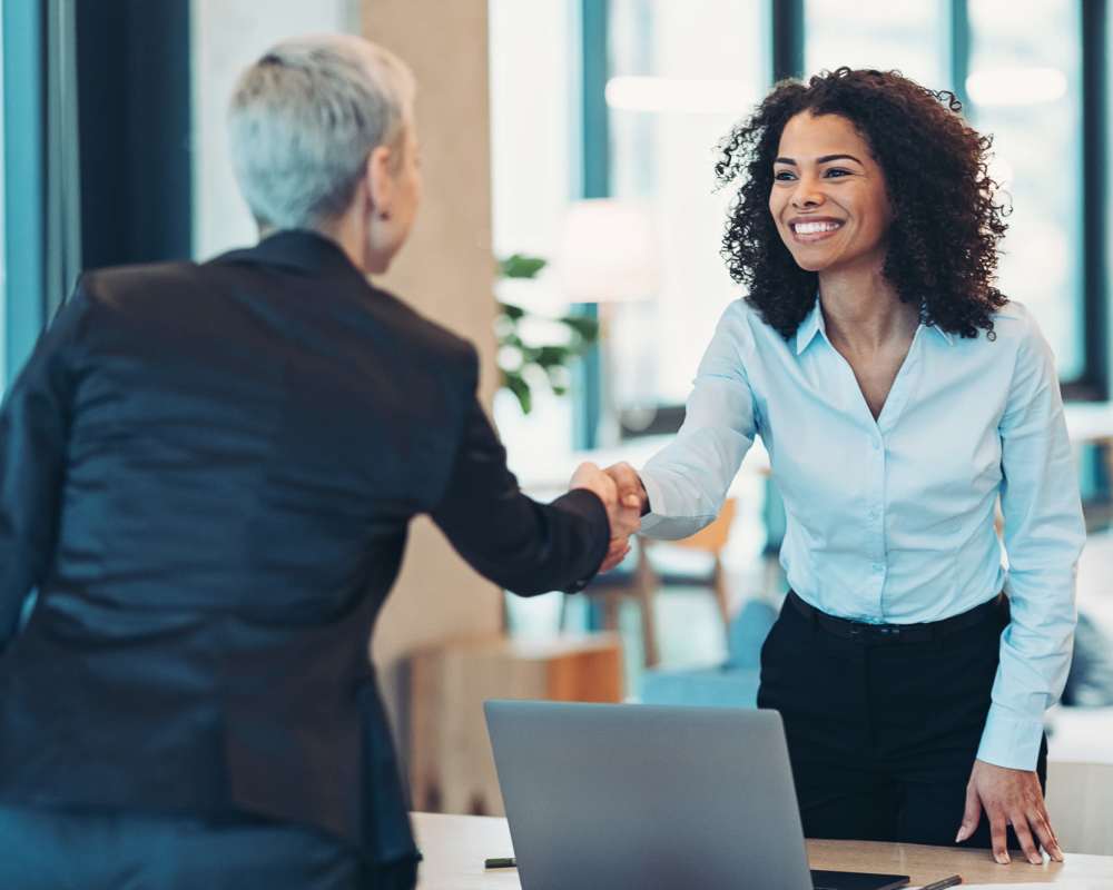 Partners meeting in office at Stintino Management in Charlotte, North Carolina