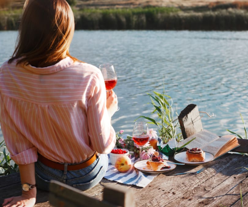 woman on dock enjoying win