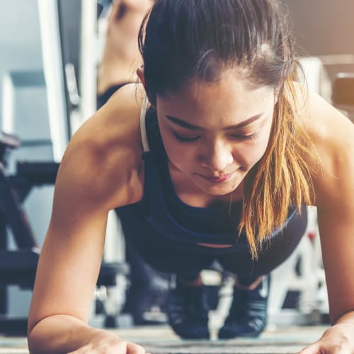 A resident working out in a gym near El Centro New Fund Housing (Officers) in El Centro, California