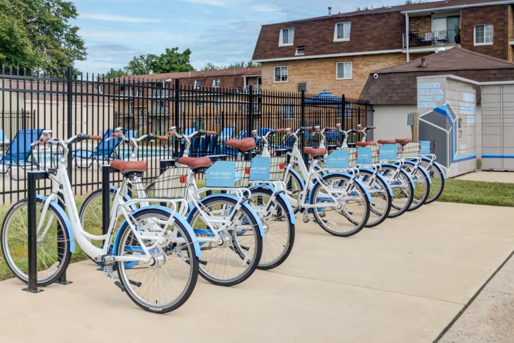 Bike Share and Amazon Hub package center outside at Main Street Apartment Homes