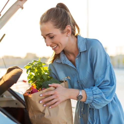 A resident loading groceries in a car near Gela Point in Virginia Beach, Virginia